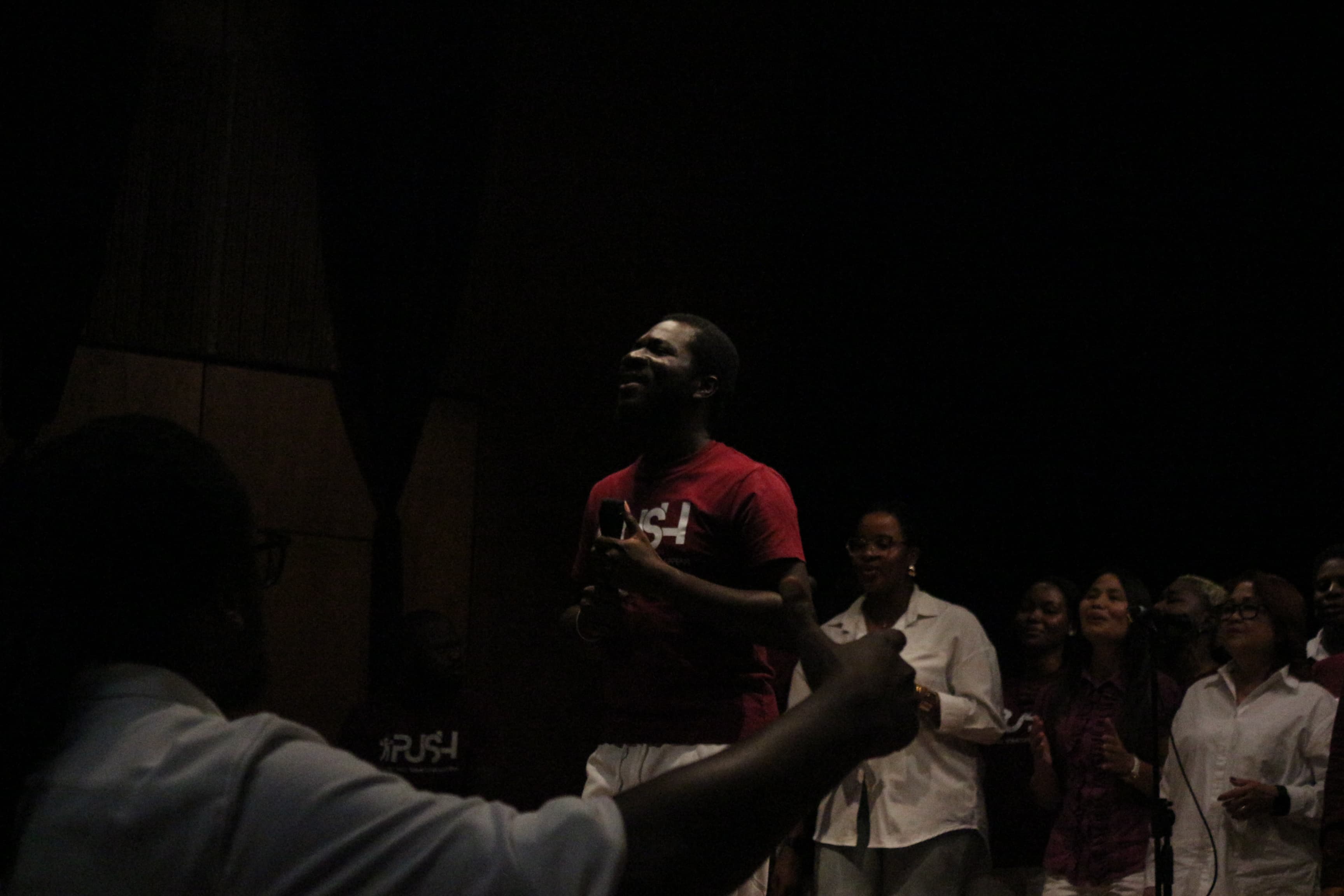 Minister leading worship at PUSH